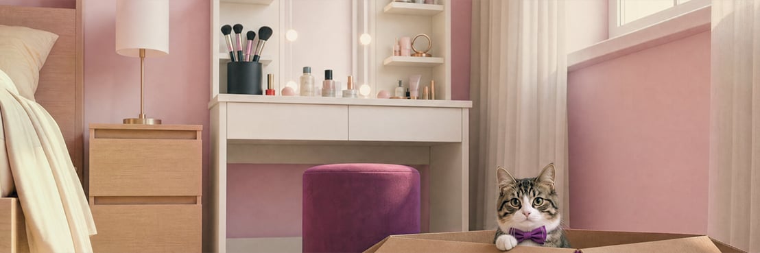 Katze schaut aus einem vidaXL Karton in einem Schlafzimmer mit Schminktisch und Aufbewahrungsschubladen.